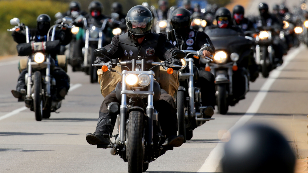 Why do bikers wear harness boots?